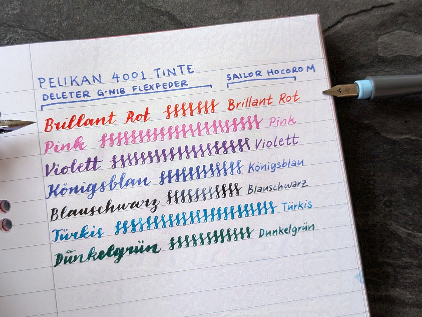 Schreibproben der farbigen Pelikan 4001 Tinten: Brillant Rot, Pink, Violett, Königsblau, Blauschwarz, Türkis, Dunkelgrün; Jeweils geschrieben mit Flexfeder und Sailor Hocoro M-Feder.